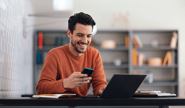 A new customer completing onboarding on a laptop